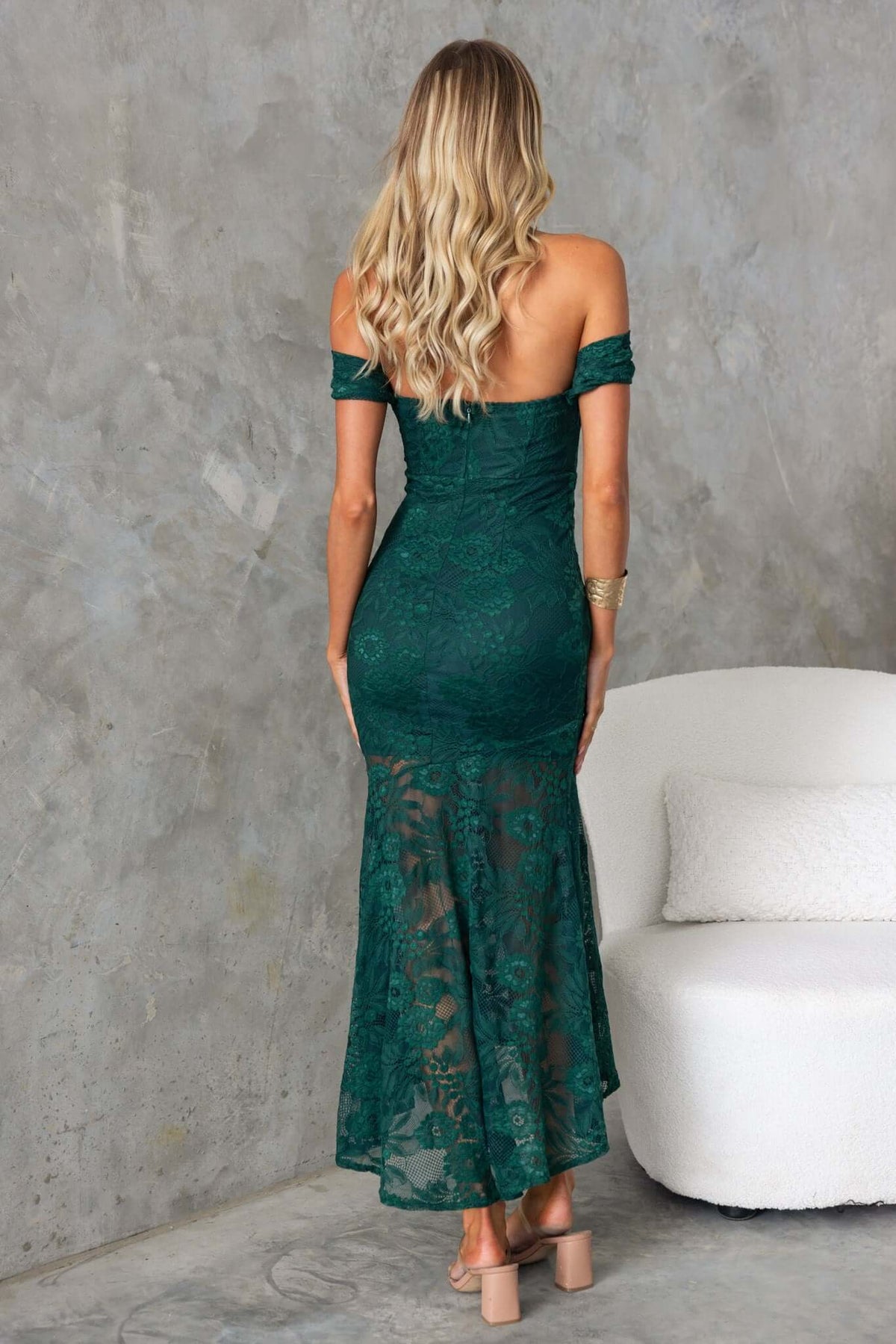 Back view of Kearney Midi Dress in dark green lace, featuring off-shoulder neckline and elegant floor-length design.