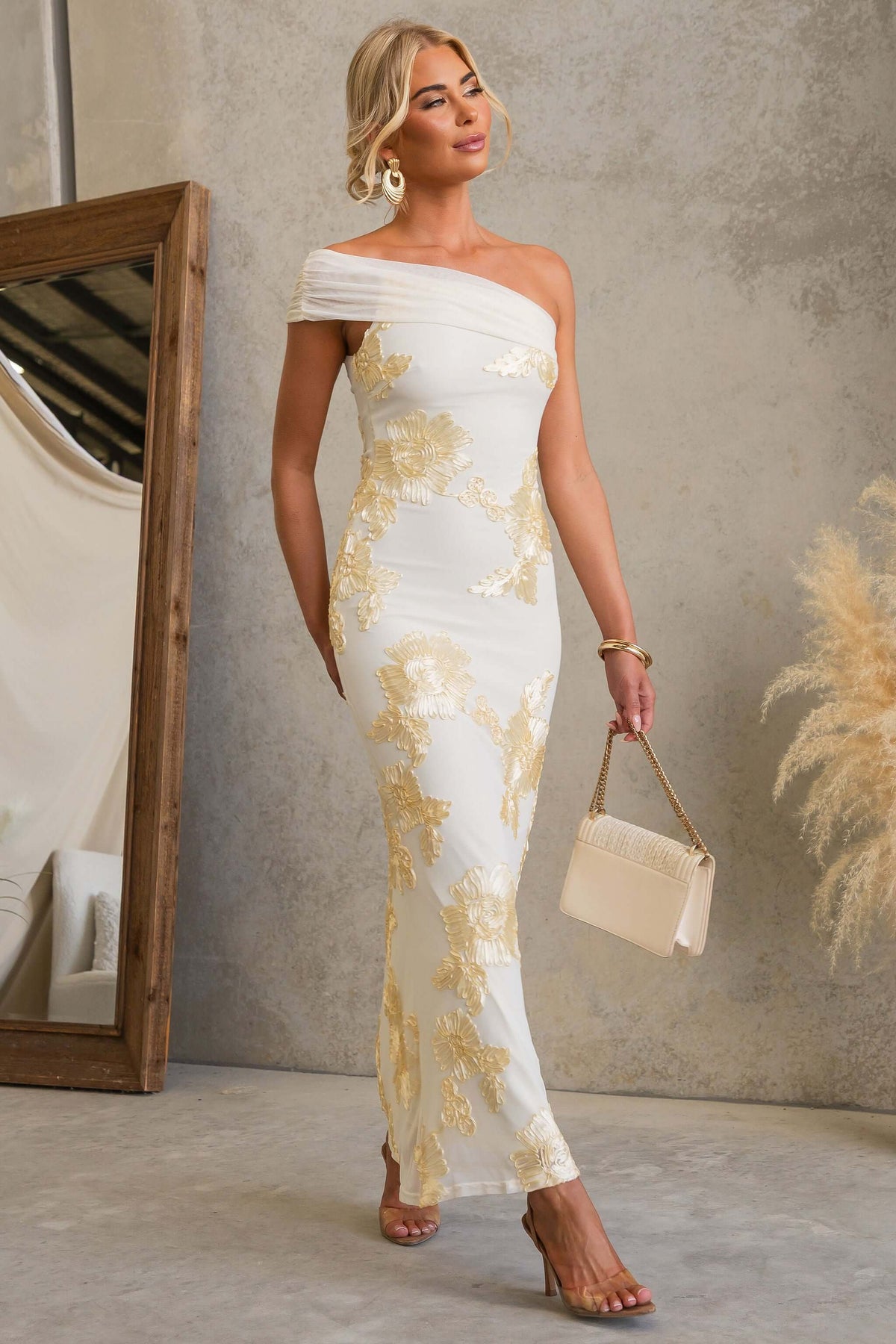 Korren Maxi Dress featuring one-shoulder neckline and embroidered mesh material.