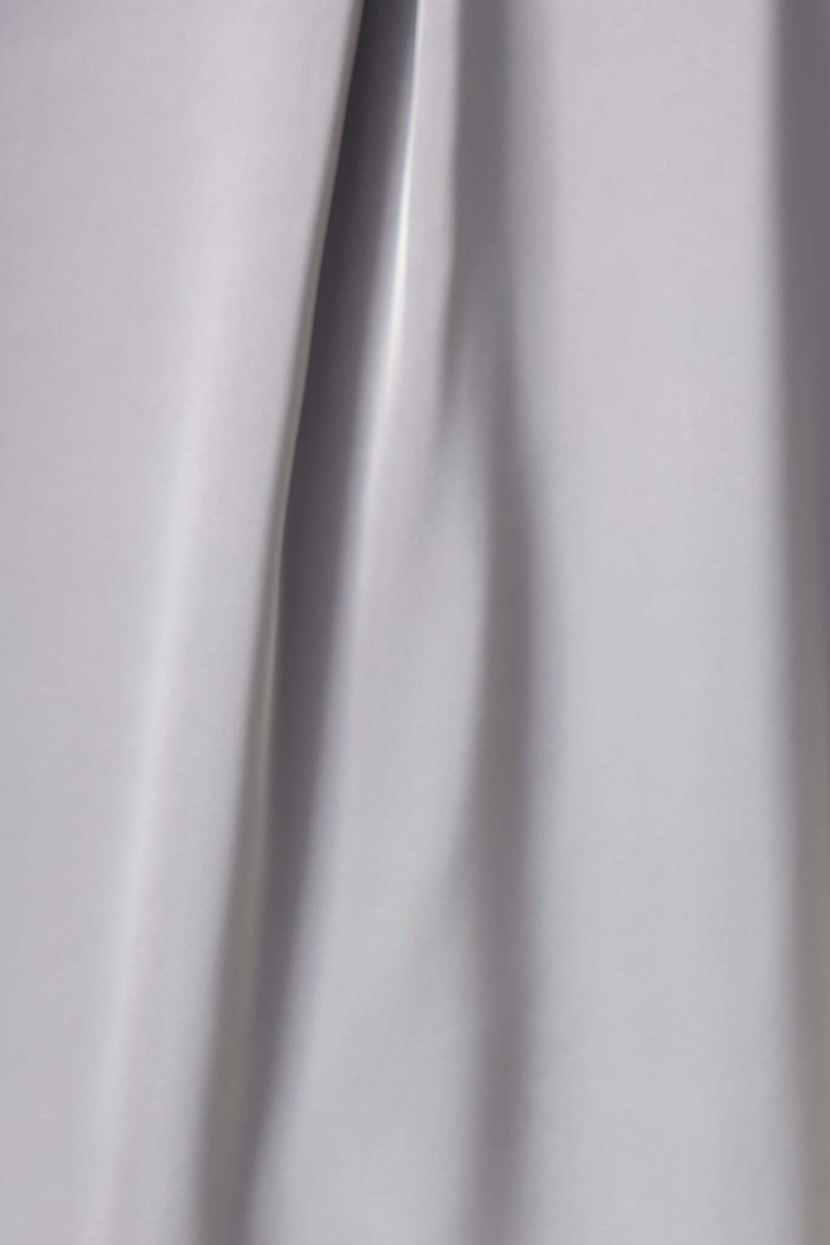 Close-up of Kortez Pants in satin material, showcasing the smooth texture and elegant draping.