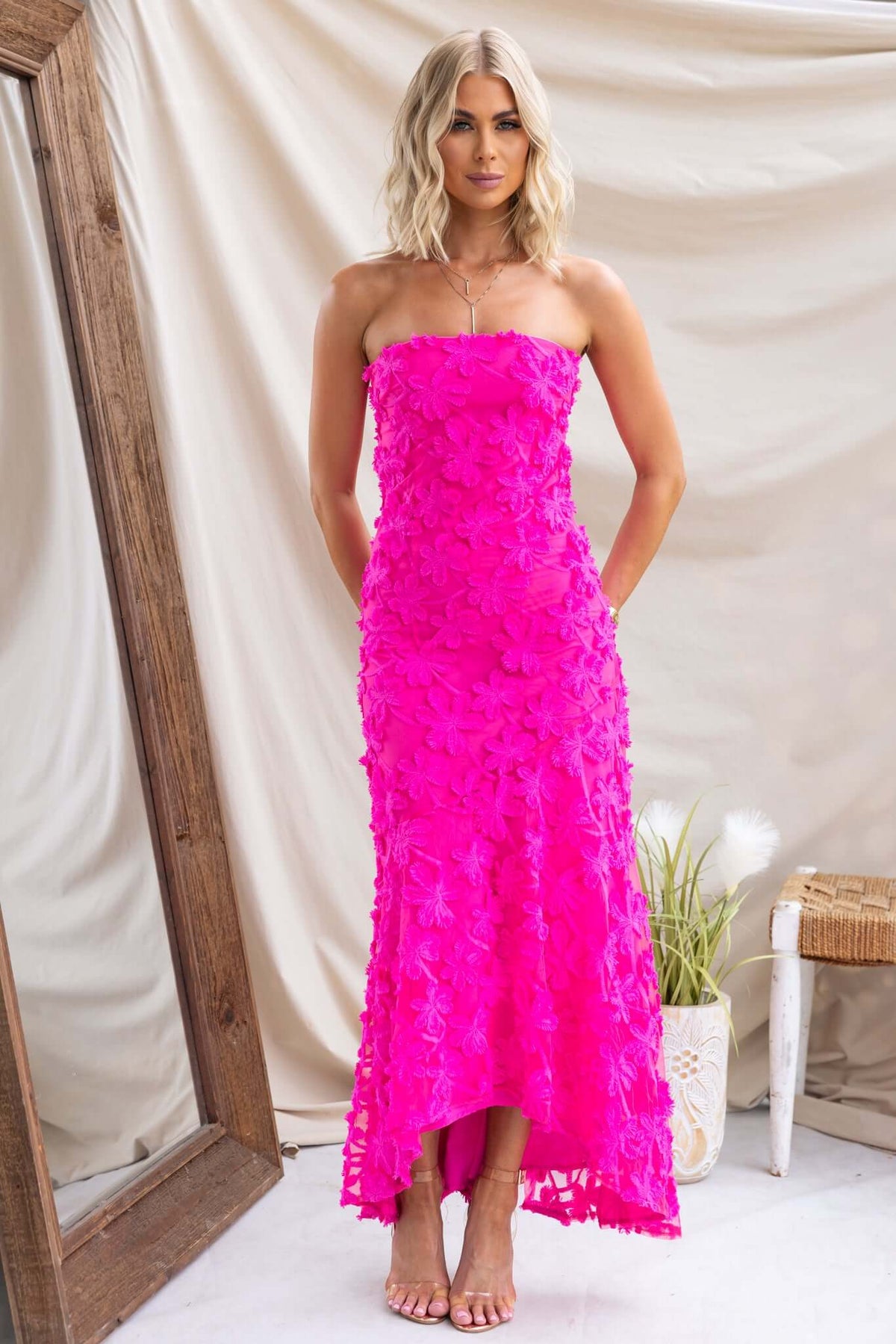 Lilium Maxi Dress: Strapless pink embroidered maxi dress with anti-slip and zip closure, styled by model.