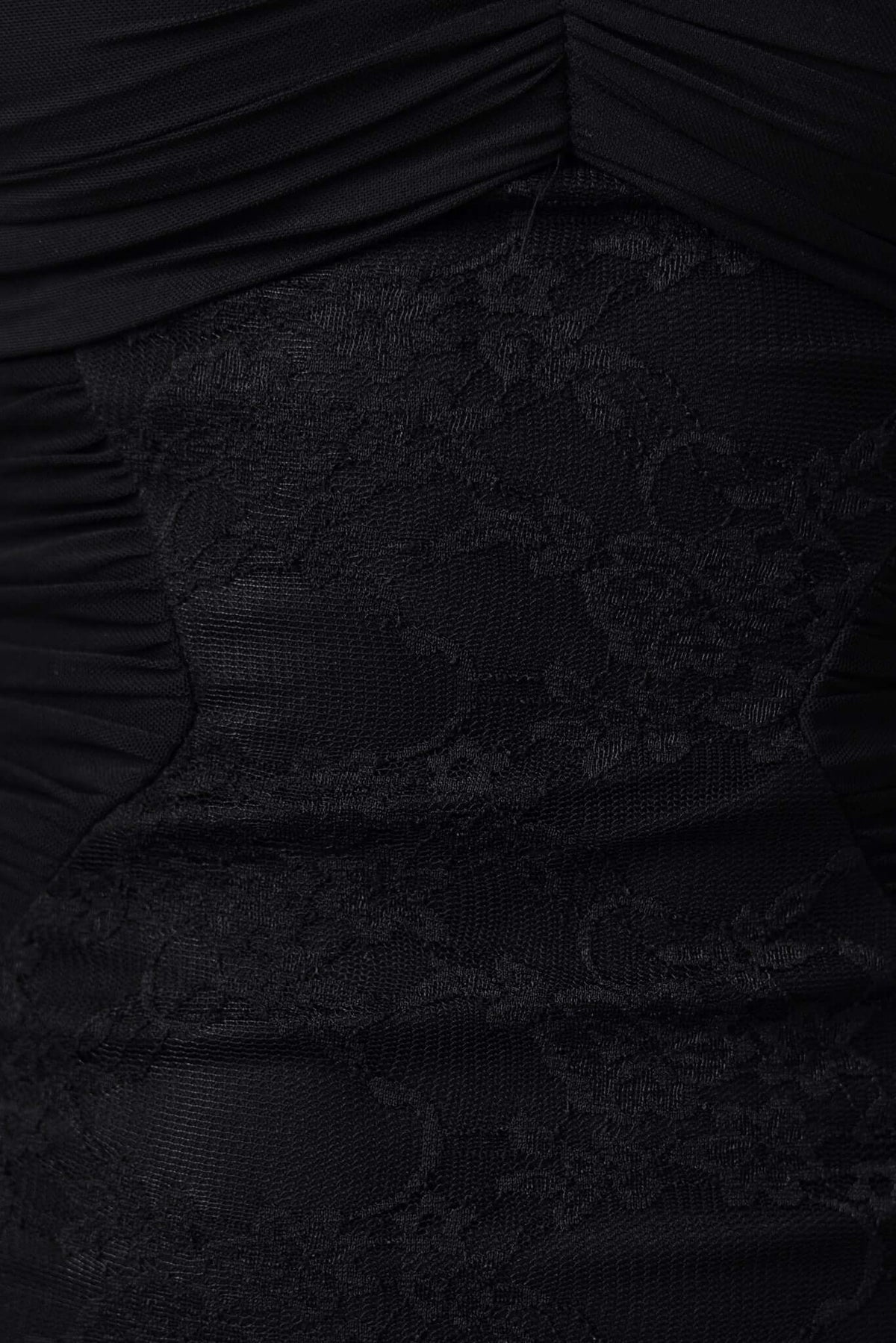 Close-up of black lace detailing on Marilou Maxi Dress, showcasing intricate design and texture.