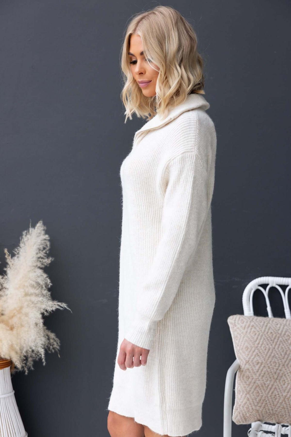 Nayeli Dress: Knit ribbed dress in cream with 1/4 zip collar; relaxed fit, soft stretchy material.
