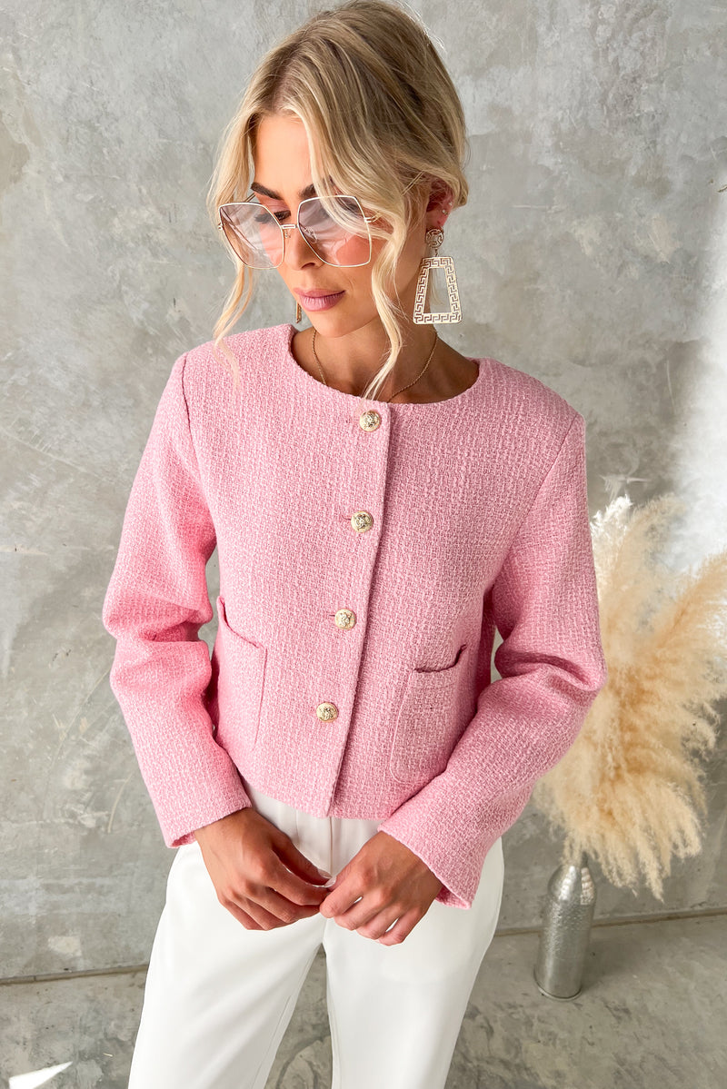 Noelle Jacket in pink chenille fabric with button-up front and pockets, styled with trendy accessories.