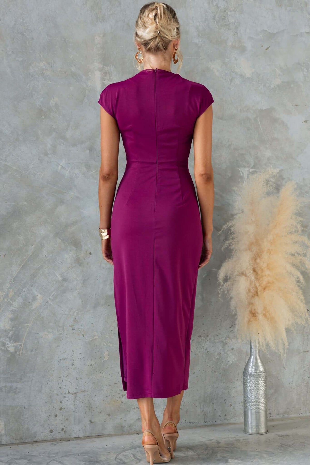 Back view of One Star Midi Dress in vibrant purple with high neckline, side split, and invisible zip feature.