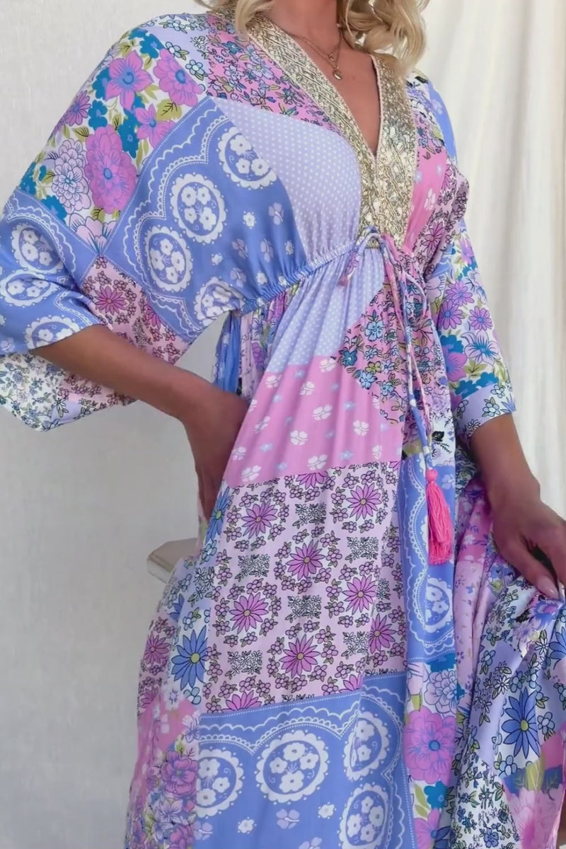 Endless Evening Maxi Dress featuring vibrant floral patterns and metallic detailing, perfect for any occasion.