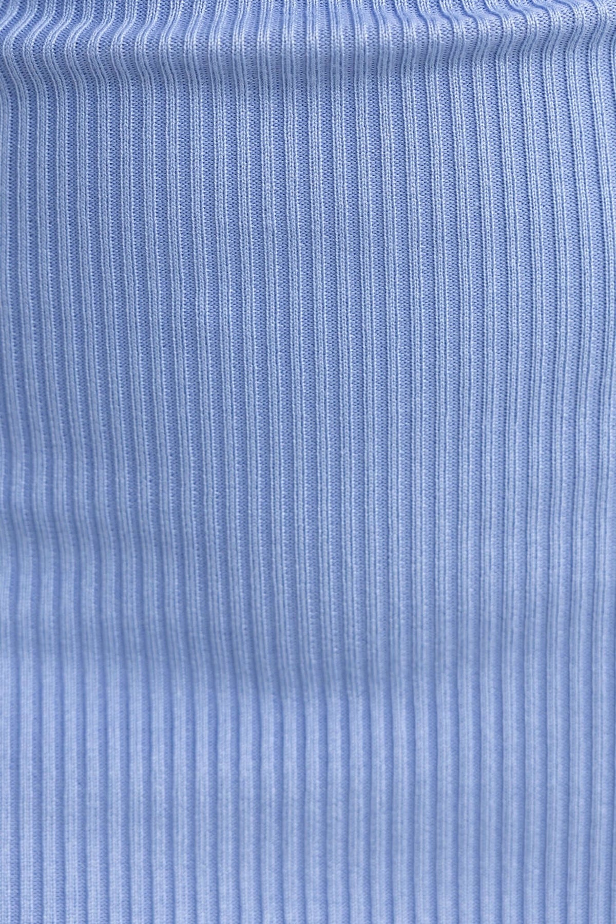 Close-up of ribbed knit material in soft blue, showcasing the texture perfect for Quieva Midi Dress.