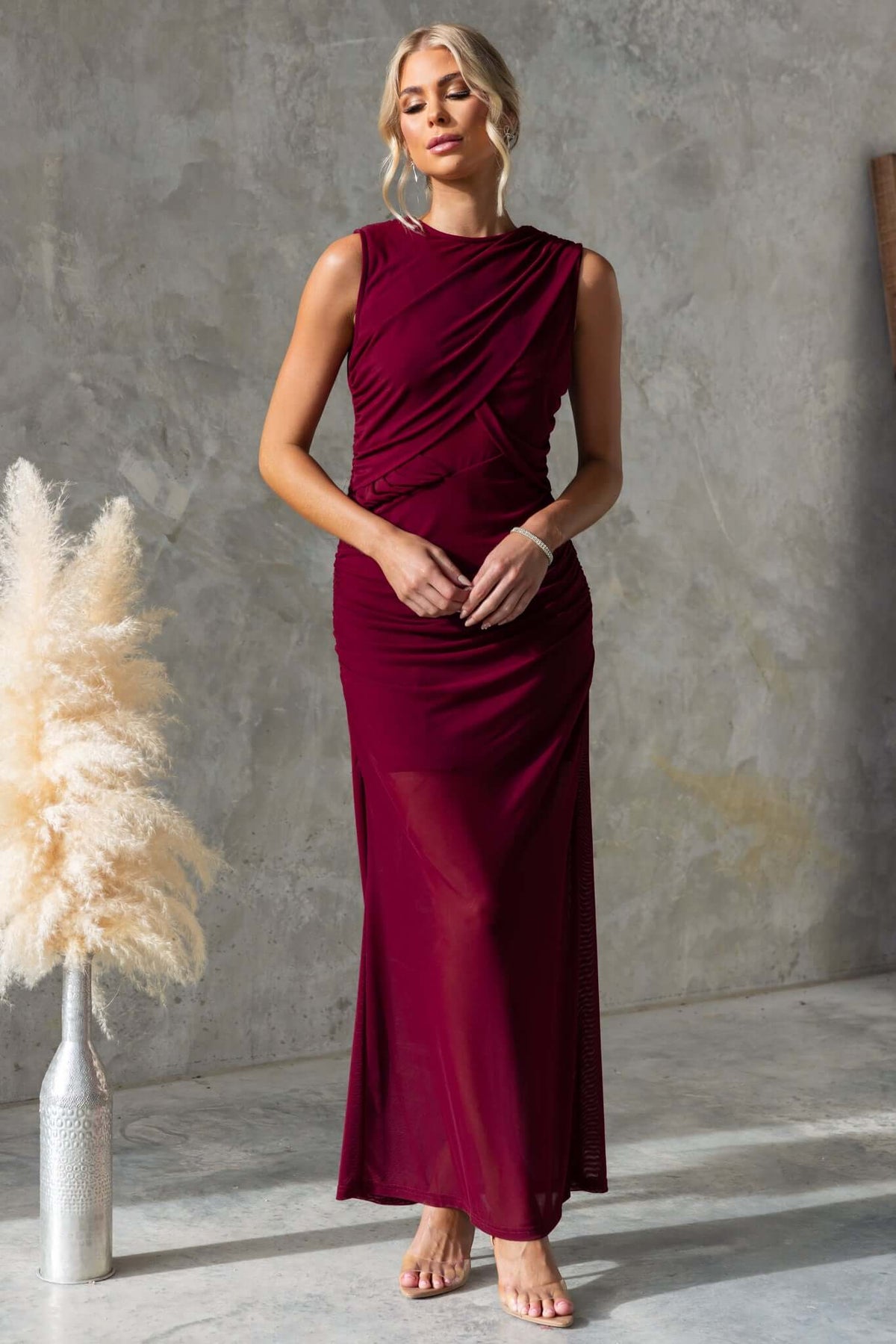 Rogers Maxi Dress in burgundy, featuring a high neckline, mesh material, and ruched design, perfect for evening wear.