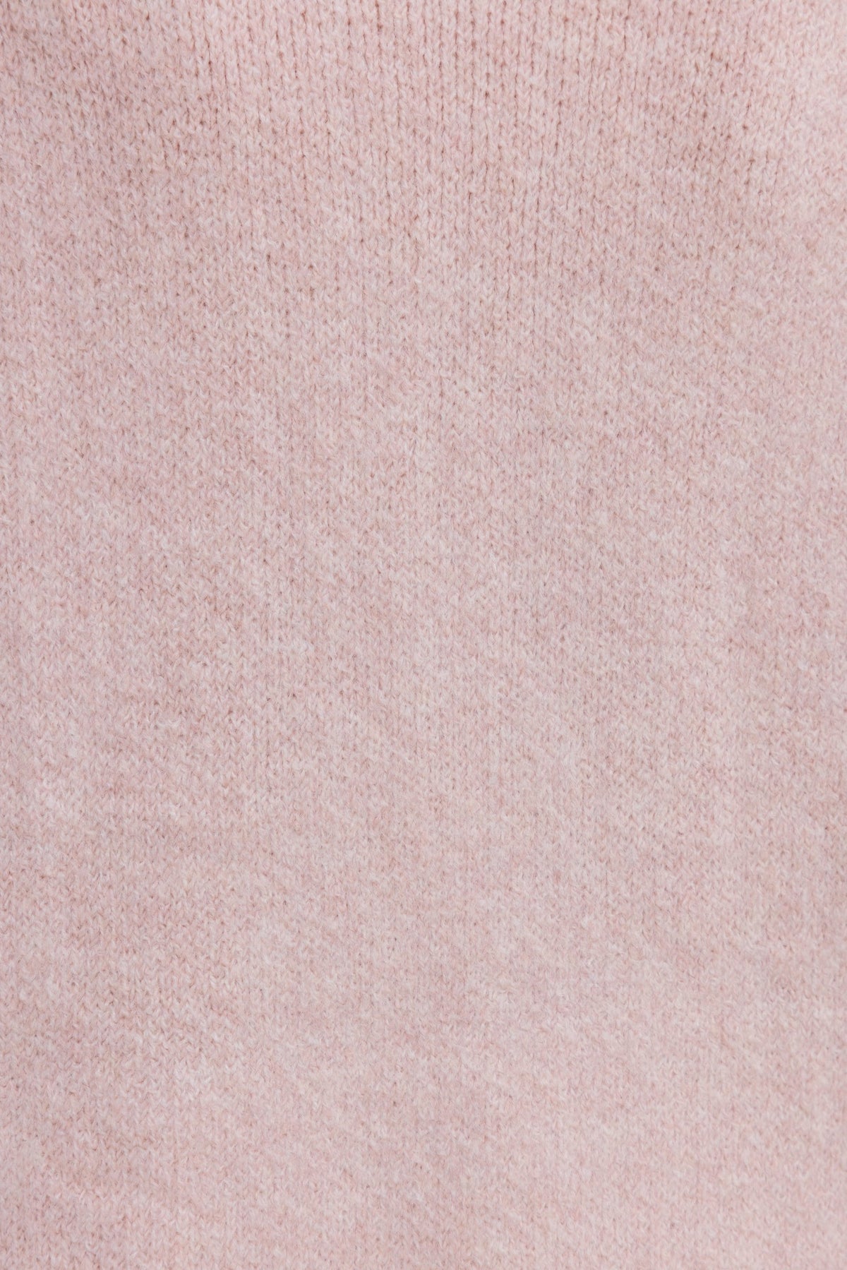 Close-up of soft pink knit fabric, highlighting the texture of the Sarlia Cardigan made from acrylic and wool blend.