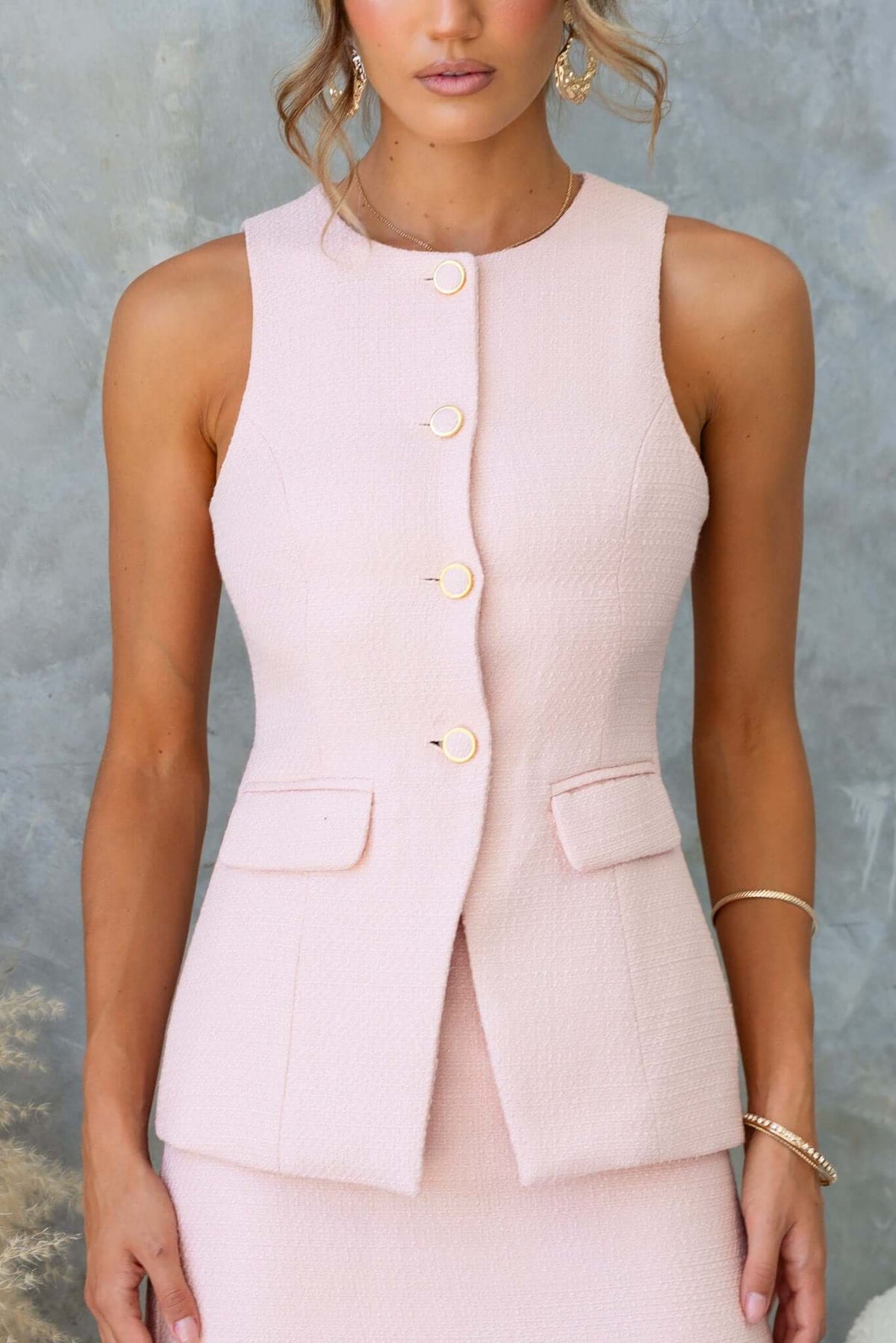 Tiffany Top in soft pink, featuring button-up front and faux pockets, designed in textured chenille fabric.
