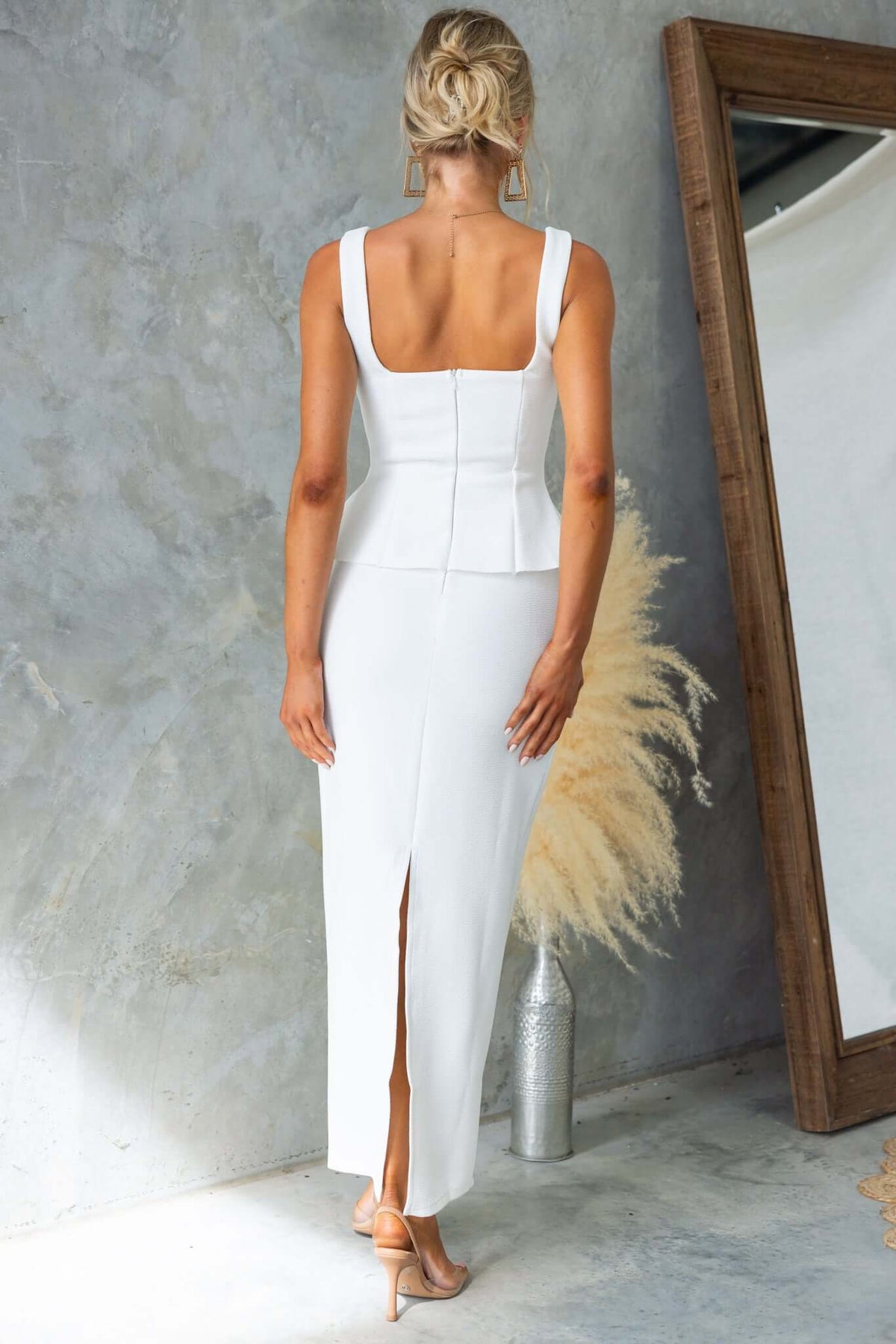 Elegant back view of Xander Maxi Dress featuring an invisible zip, back split, and lined bust, perfect for stylish occasions.