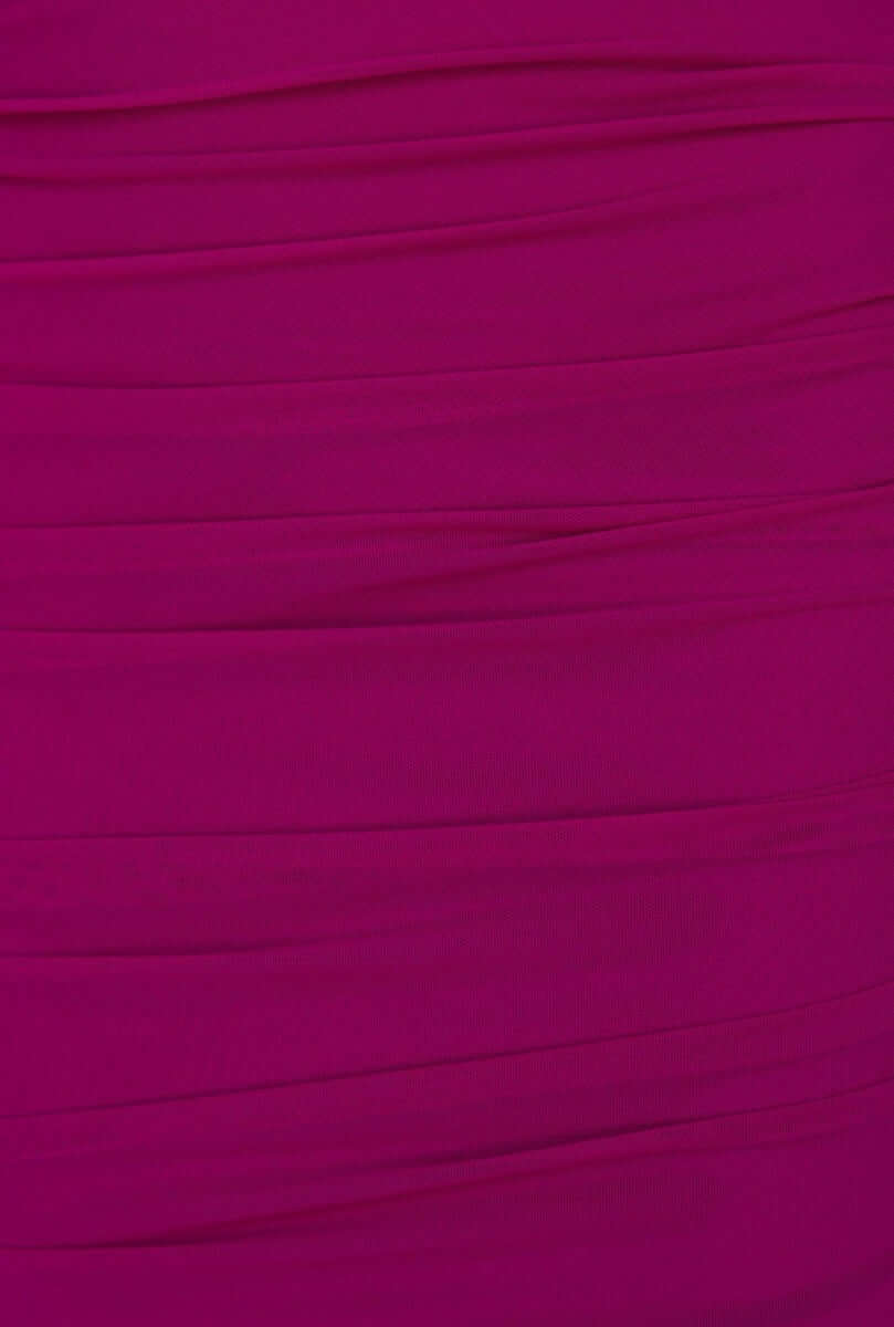 Close-up of rich fuchsia mesh overlay fabric with pleated texture, perfect for a stylish one-shoulder top design.